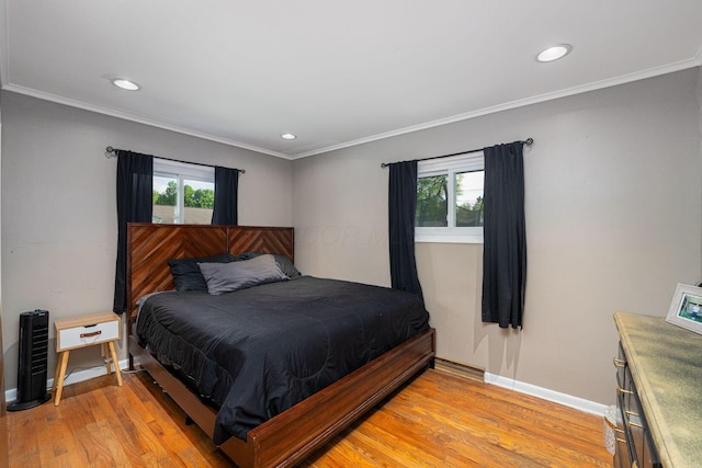 26 Garrick St, Newark, OH 43055 - bedroom with multiple windows, light wood-style floors, baseboards, ornamental molding, and recessed lighting