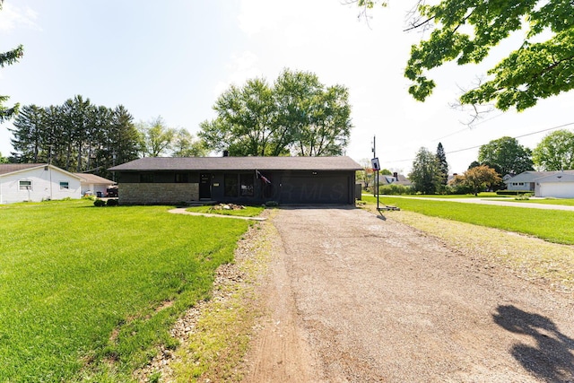 26 Garrick St, Newark, OH 43055 - ranch-style house with driveway, a garage, and a front yard