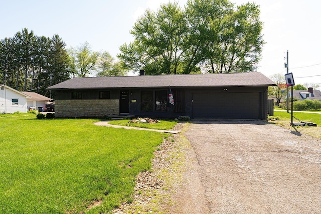 26 Garrick St, Newark, OH 43055 - ranch-style house with asphalt driveway, an attached garage, stone siding, and a front yard