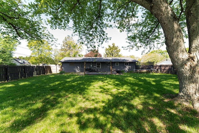 26 Garrick St, Newark, OH 43055 - back of house with a trampoline and a chimney