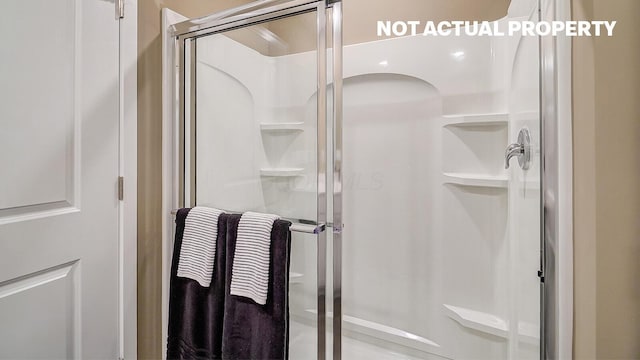 bathroom featuring a stall shower