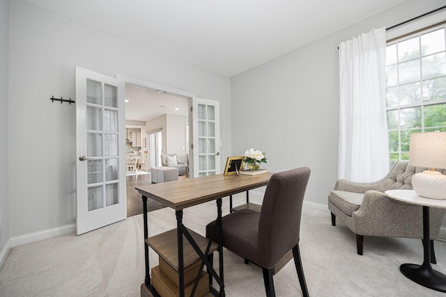 382 Beecher Rd, Columbus, OH 43230 - dining room featuring french doors, baseboards, and light colored carpet