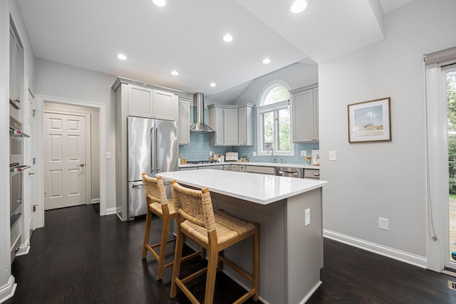 382 Beecher Rd, Columbus, OH 43230 - kitchen with stainless steel appliances, dark wood finished floors, tasteful backsplash, healthy amount of natural light, and recessed lighting