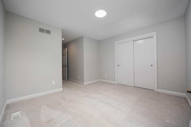 382 Beecher Rd, Columbus, OH 43230 - unfurnished bedroom featuring carpet, baseboards, and a closet