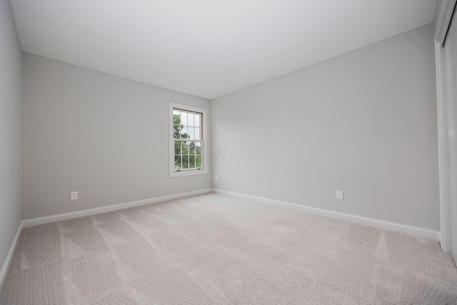 382 Beecher Rd, Columbus, OH 43230 - empty room with baseboards and light colored carpet