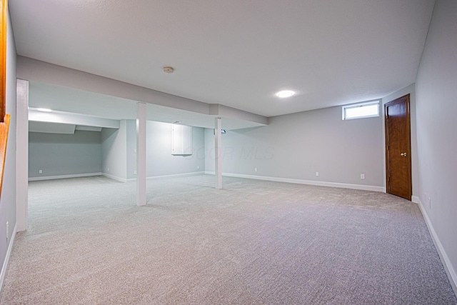 382 Beecher Rd, Columbus, OH 43230 - basement featuring light colored carpet and baseboards
