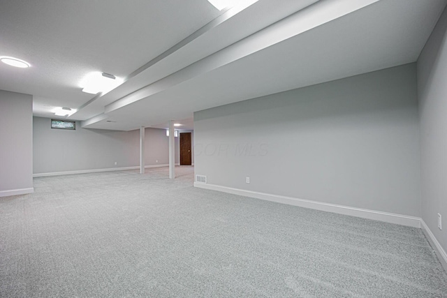 382 Beecher Rd, Columbus, OH 43230 - finished basement featuring light carpet and baseboards