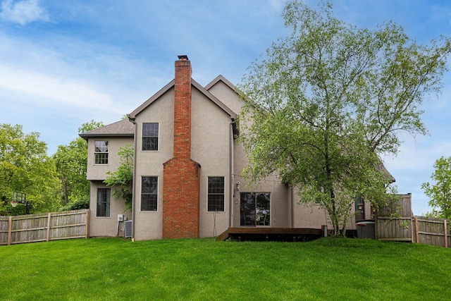 382 Beecher Rd, Columbus, OH 43230 - back of property featuring stucco siding and a chimney