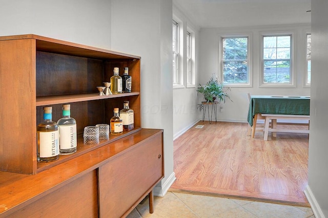 668 Enfield Rd, Columbus, OH 43209 - hall featuring wood finished floors and baseboards