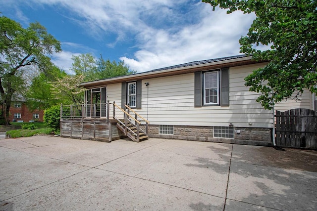 668 Enfield Rd, Columbus, OH 43209 - view of front of house with a patio area and fence