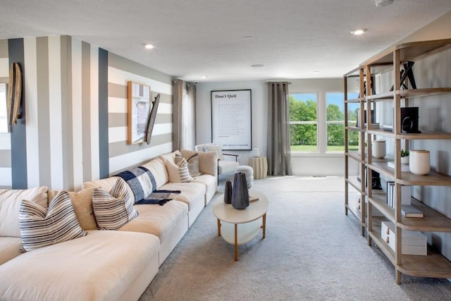 carpeted living room with recessed lighting