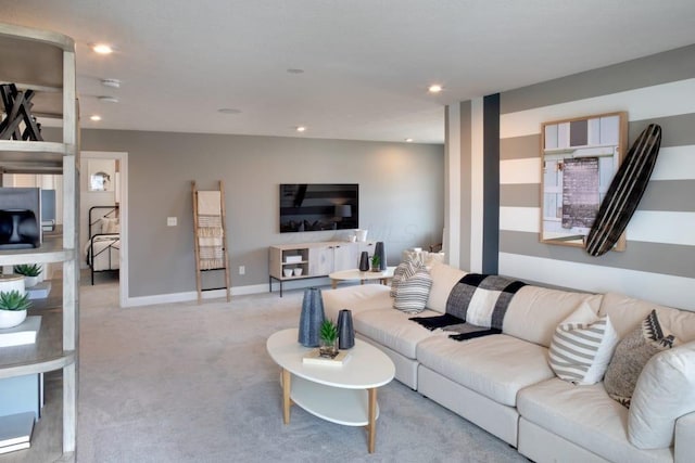 living room featuring light carpet, baseboards, and recessed lighting