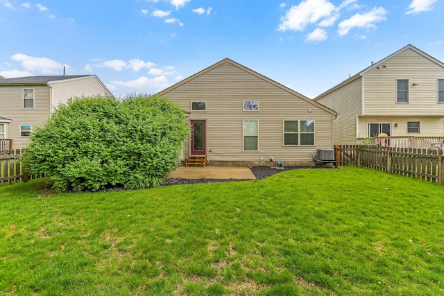 2099 Winding Hollow Dr, Grove City, OH 43123 - back of property featuring a yard, cooling unit, a patio, and a fenced backyard