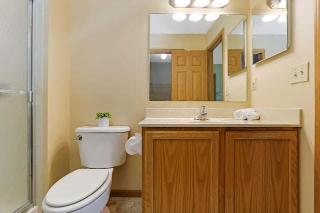 2099 Winding Hollow Dr, Grove City, OH 43123 - bathroom featuring a shower with door, vanity, and toilet