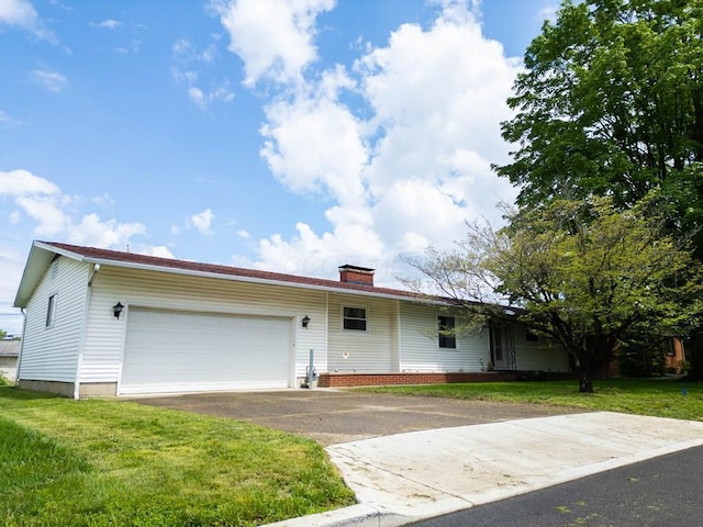 ranch-style home featuring a chimney, driveway, a front lawn, and a garage