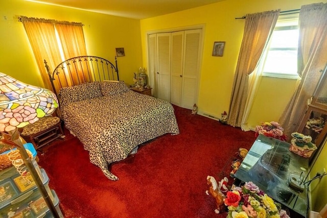 carpeted bedroom with a closet