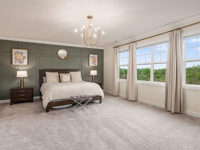 carpeted bedroom with an inviting chandelier, crown molding, and baseboards