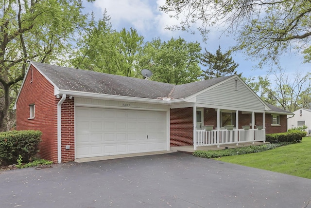 ranch-style home with covered porch, brick siding, a garage, asphalt driveway, and roof with shingles