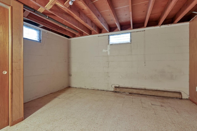 basement featuring tile patterned floors