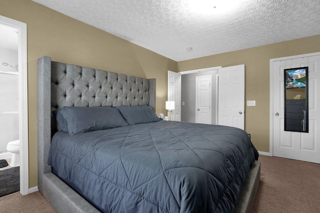 4830 Brice Pond Dr Unit 1A, Canal Winchester, OH 43110 - bedroom featuring carpet flooring, a textured ceiling, ensuite bathroom, and baseboards