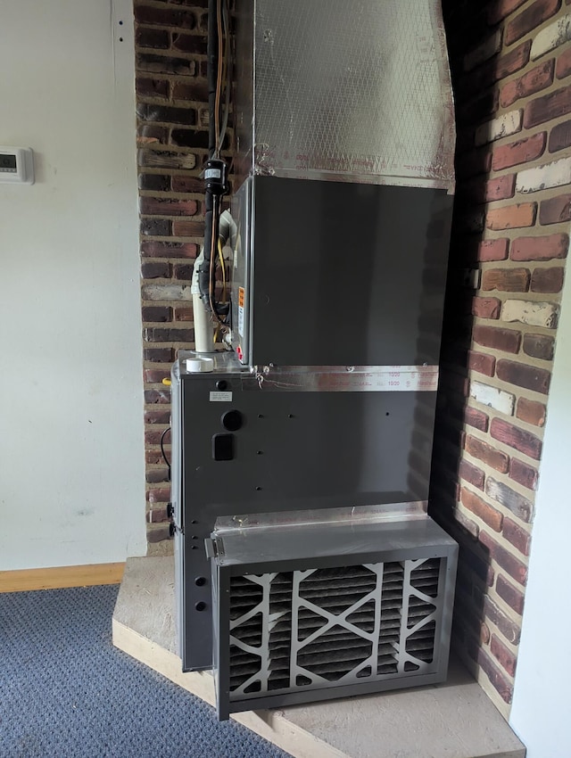 room details with heating unit and baseboards