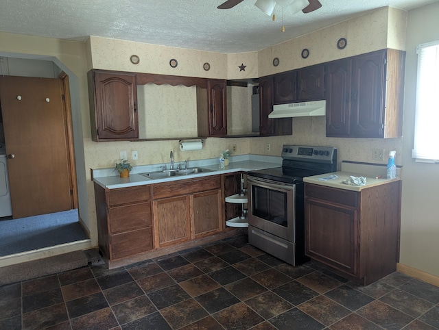 kitchen featuring under cabinet range hood, stainless steel electric range, a sink, and a healthy amount of sunlight