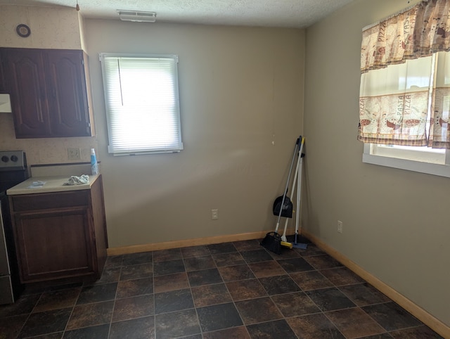 interior space featuring visible vents and baseboards