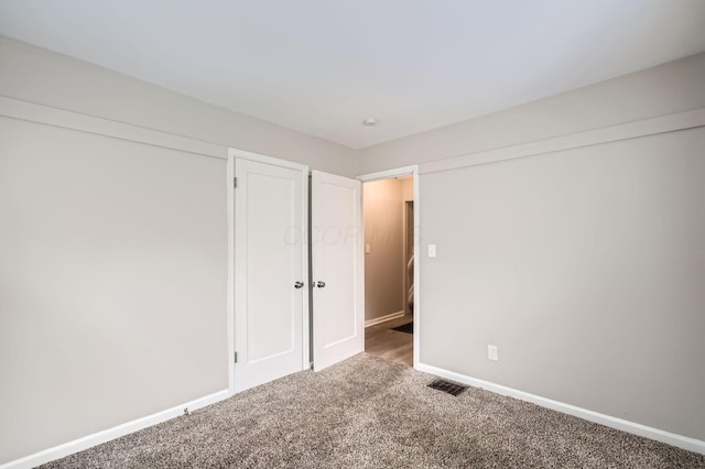 3140 Hamilton Ave, Columbus, OH 43224 - unfurnished bedroom with carpet and baseboards