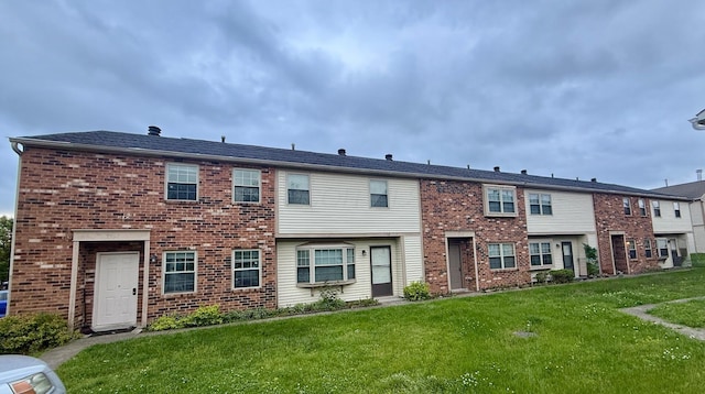 1721 Worthington Run Dr Unit 1721-1731, Columbus, OH 43235 - view of front facade with a front lawn and brick siding