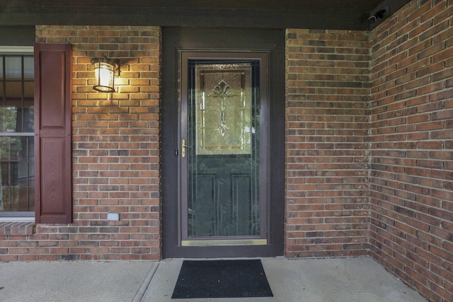 7689 Godfrey Cir, Reynoldsburg, OH 43068 - property entrance with brick siding and covered porch