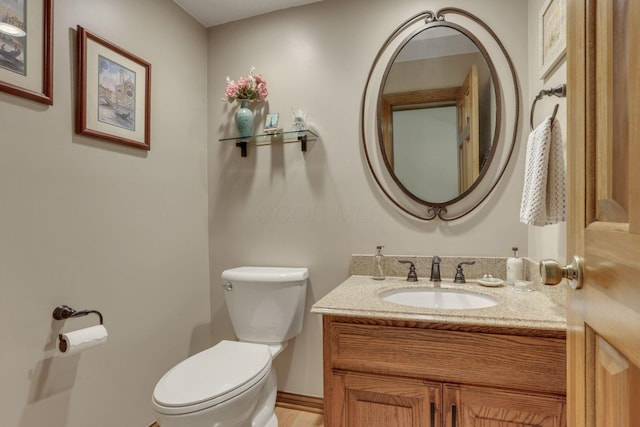 7689 Godfrey Cir, Reynoldsburg, OH 43068 - bathroom featuring vanity and wood finished floors