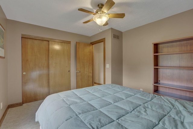 7689 Godfrey Cir, Reynoldsburg, OH 43068 - bedroom featuring carpet, a closet, and ceiling fan