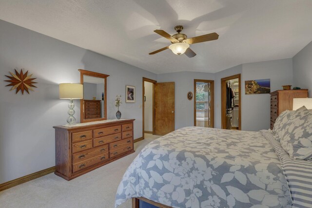 7689 Godfrey Cir, Reynoldsburg, OH 43068 - bedroom with light carpet, a spacious closet, a closet, and a ceiling fan