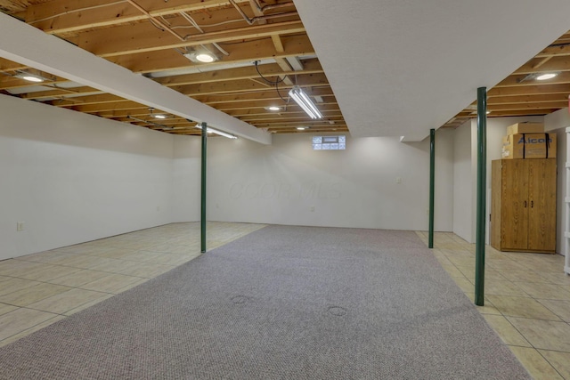 7689 Godfrey Cir, Reynoldsburg, OH 43068 - below grade area with light tile patterned flooring