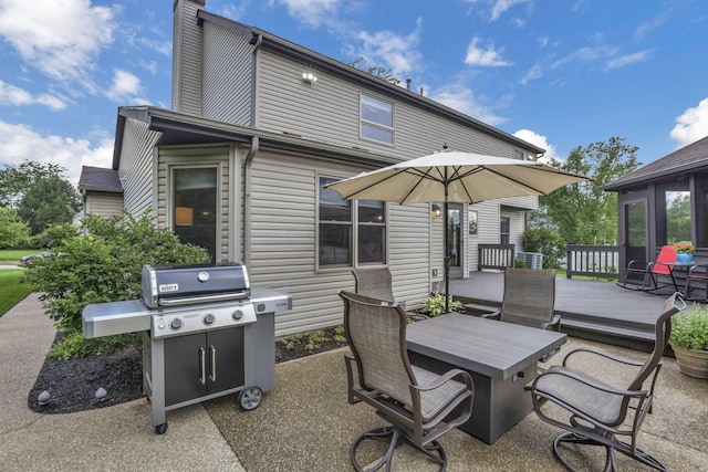 7689 Godfrey Cir, Reynoldsburg, OH 43068 - view of patio / terrace featuring a wooden deck, outdoor dining area, and grilling area