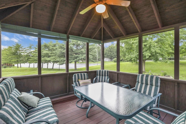 7689 Godfrey Cir, Reynoldsburg, OH 43068 - sunroom with a ceiling fan, outdoor dining space, and view of wooded area