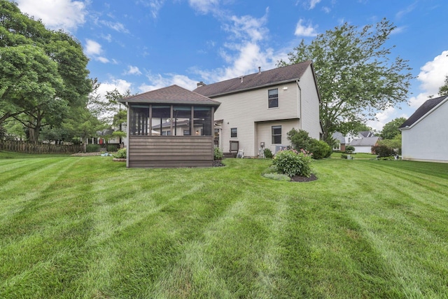 7689 Godfrey Cir, Reynoldsburg, OH 43068 - back of house featuring a sunroom