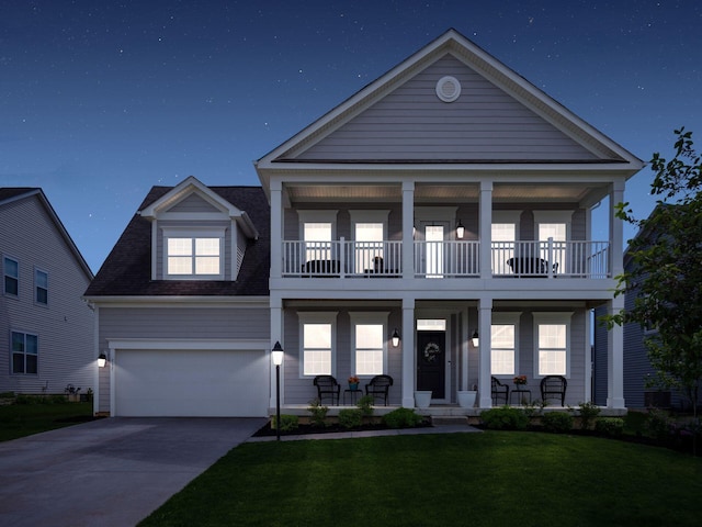 757 Avebury Dr, Pickerington, OH 43147 - view of front facade featuring a balcony, covered porch, concrete driveway, and a front yard