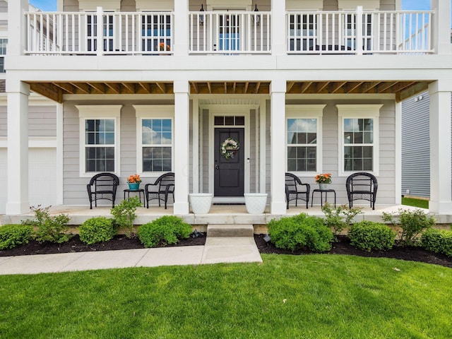 757 Avebury Dr, Pickerington, OH 43147 - view of exterior entry featuring a porch and a lawn