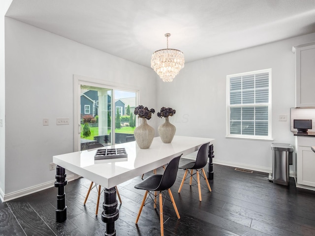 757 Avebury Dr, Pickerington, OH 43147 - dining space with a chandelier, dark wood-style floors, and baseboards