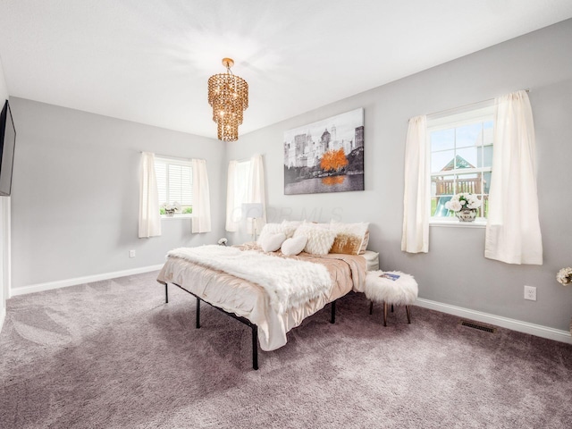 757 Avebury Dr, Pickerington, OH 43147 - bedroom with a chandelier, carpet flooring, and multiple windows