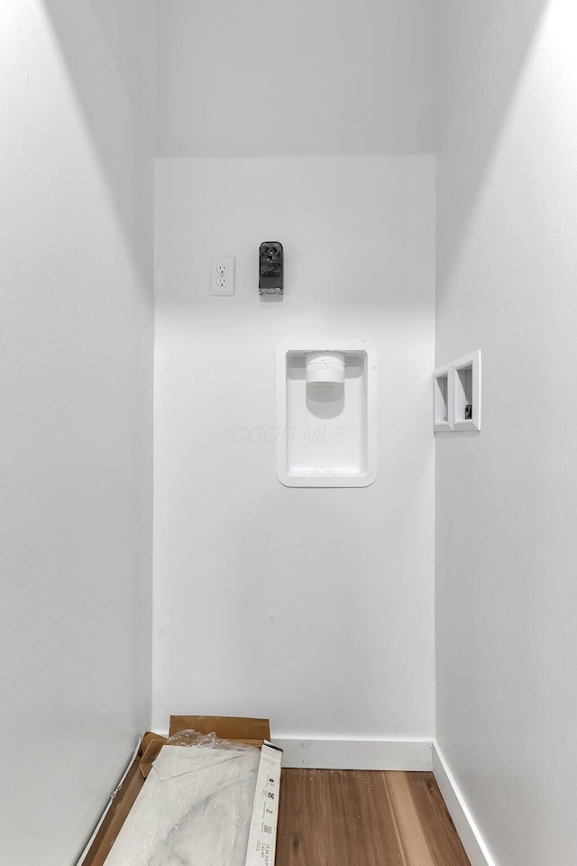 404 Stella Ave, Circleville, OH 43113 - clothes washing area featuring wood finished floors and electric dryer hookup