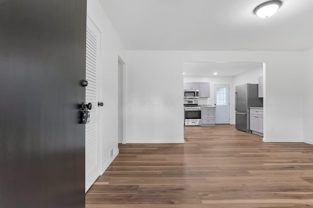 404 Stella Ave, Circleville, OH 43113 - hall featuring baseboards and wood finished floors