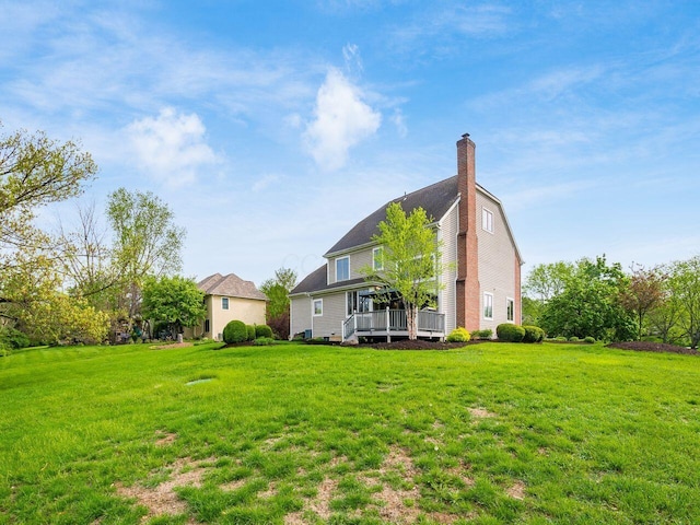 view of yard featuring a wooden deck