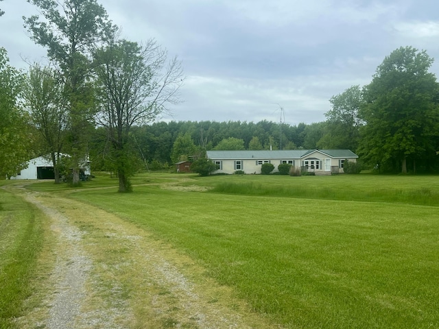 256 Mudswitch Rd, Martinsville, OH 45146 - view of grassy yard featuring driveway and a view of trees