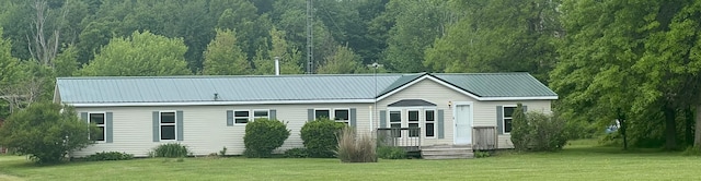 256 Mudswitch Rd, Martinsville, OH 45146 - back of house with a lawn, a wooded view, and metal roof
