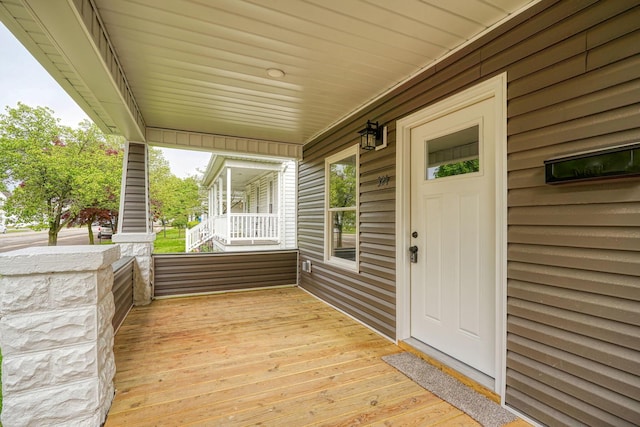 324 E Mound St, Circleville, OH 43113 - deck featuring a porch