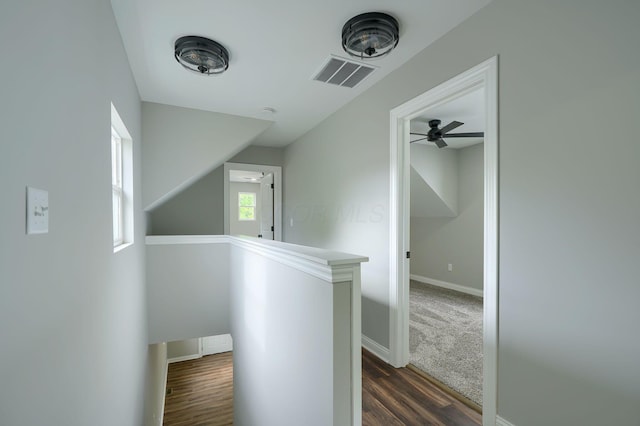 324 E Mound St, Circleville, OH 43113 - hallway featuring baseboards, an upstairs landing, dark wood finished floors, and visible vents