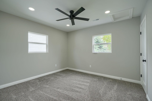 324 E Mound St, Circleville, OH 43113 - spare room with carpet, attic access, baseboards, and recessed lighting