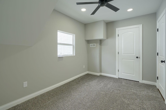 324 E Mound St, Circleville, OH 43113 - interior space featuring baseboards, dark carpet, visible vents, and ceiling fan